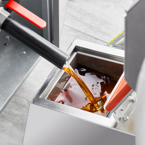 BOSS cleaning fryer oil through basket filter — commercial fryer oil management system
