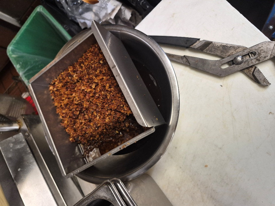 Filtered debris caught by The BOSS after the first filtering run